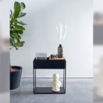 A lifestyle shot of the black Allermuir Crate storage unit